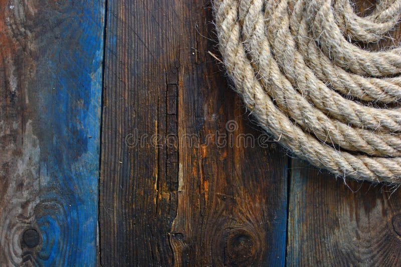 Top View Tied Nautical Rope Grunge Wooden Surface Stock Photo by