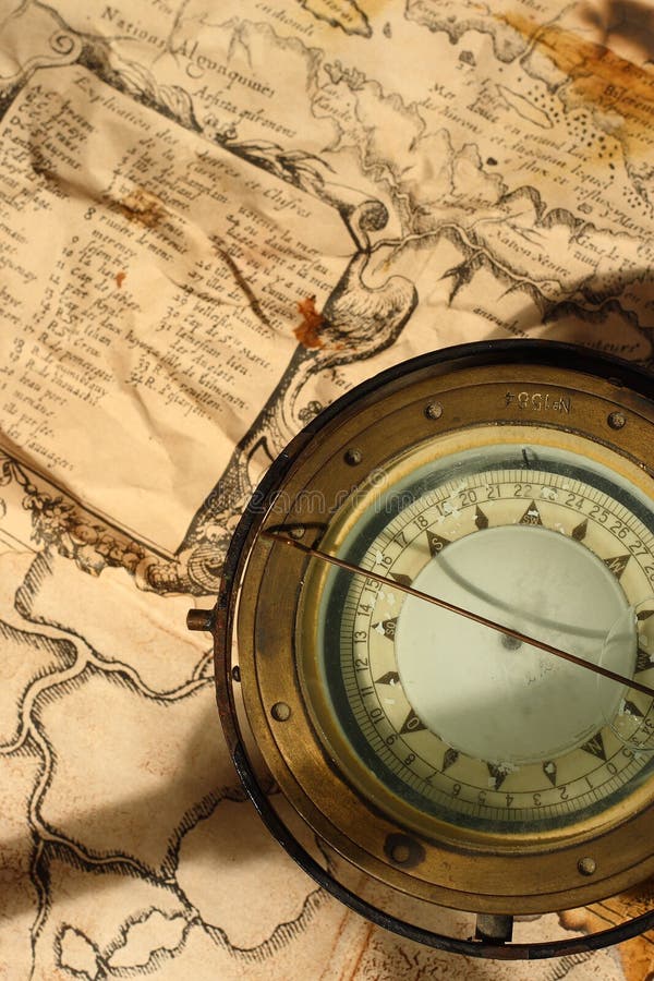 Compass and Chess on old map Stock Photo by ©kwanchaidp 75914583