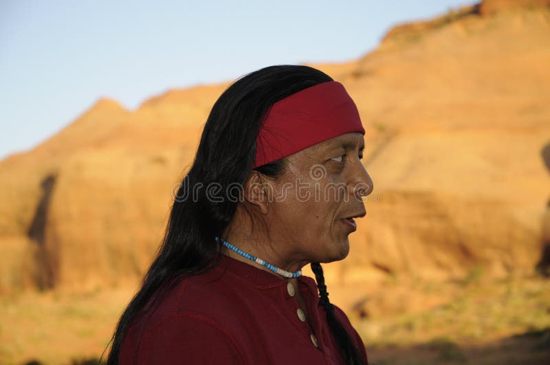 Navaho man that acts as a tour guide tells of the Navajo way of life and beliefs with music and dance. Navaho man that acts as a tour guide tells of the Navajo way of life and beliefs with music and dance