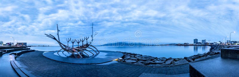 Solfar Sun Voyager metal Viking ship in Reykjavik, Iceland facing the harbor waterfront. Solfar Sun Voyager metal Viking ship in Reykjavik, Iceland facing the harbor waterfront.