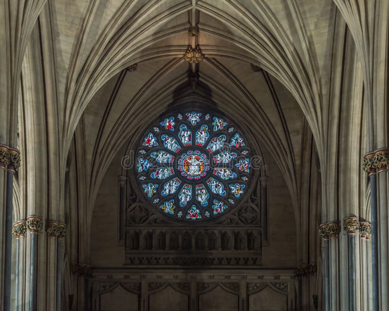 Nave Stained Glass Window with Arches at Bristol Cathedral Editorial