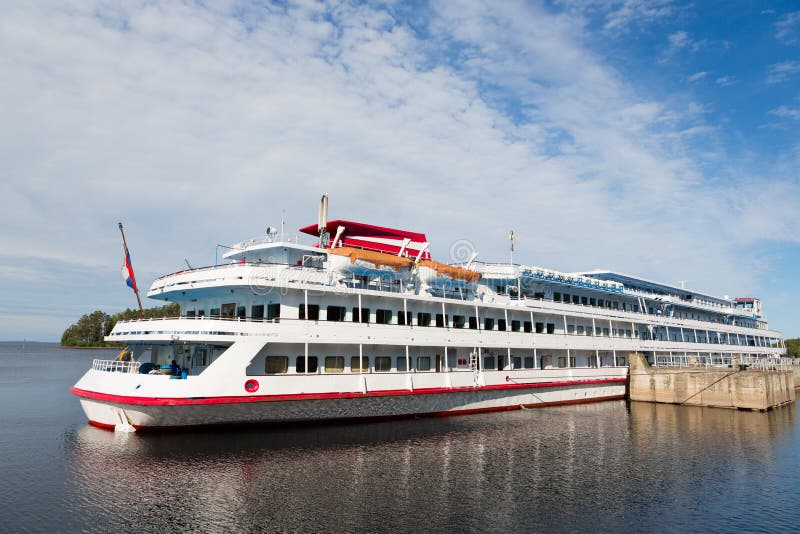 Passenger cruise ship standing at the pier on the island of Valaam. Karelia, Russia. Passenger cruise ship standing at the pier on the island of Valaam. Karelia, Russia.