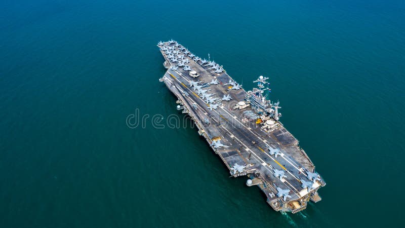 Navy Nuclear Aircraft carrier, Military navy ship carrier full loading fighter jet aircraft, Aerial view