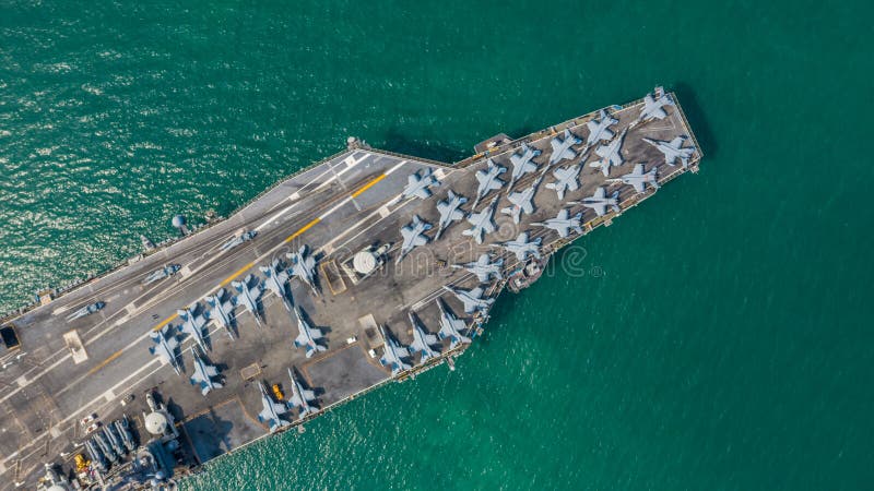 Navy Nuclear Aircraft carrier, Military navy ship carrier full loading fighter jet aircraft, Aerial view