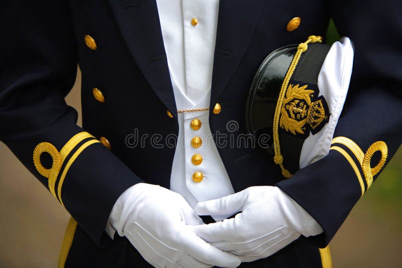 Navy Officer Holding his Cap royalty free stock images Navy Officer Holding his Cap royalty free stock images