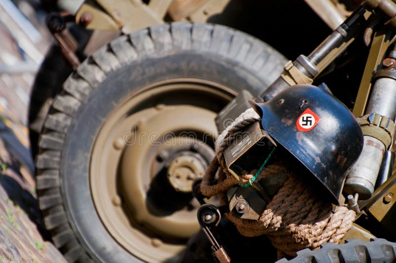 Nazi Helmet on American Jeep stock photography
