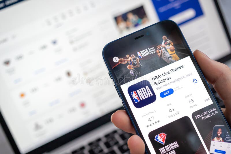 NBA App On The Mobile Phone Screen Woman Using NBA Live Games And nba-app-on-the-mobile-phone-screen-woman-using-nba-live-games-and