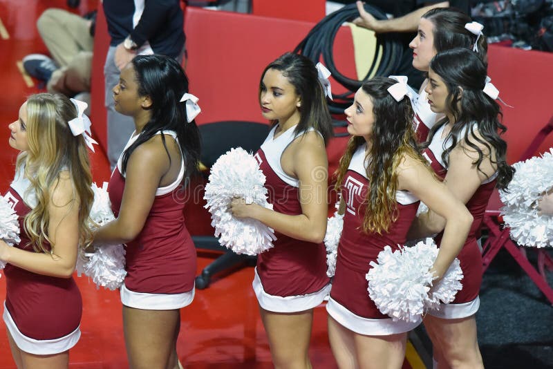 PHILADELPHIA - DECEMBER 19: The Temple cheerleading squad performs during the women's basketball game December 19, 2015 in Philadelphia. PHILADELPHIA - DECEMBER 19: The Temple cheerleading squad performs during the women's basketball game December 19, 2015 in Philadelphia.