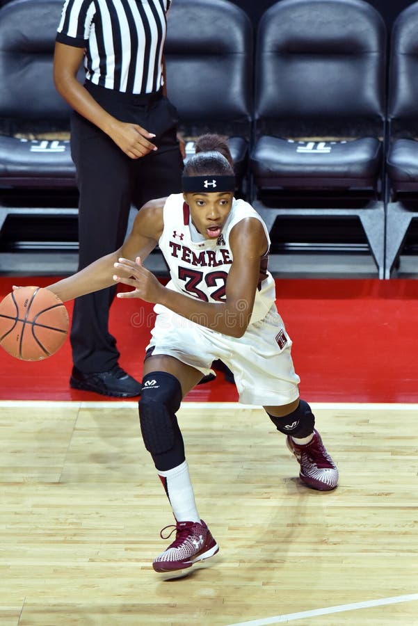 PHILADELPHIA - DECEMBER 19: Temple Owls guard Donnaizha Fountain (32) dribbles the ball on the perimeter during the women's basketball game December 19, 2015 in Philadelphia. PHILADELPHIA - DECEMBER 19: Temple Owls guard Donnaizha Fountain (32) dribbles the ball on the perimeter during the women's basketball game December 19, 2015 in Philadelphia.