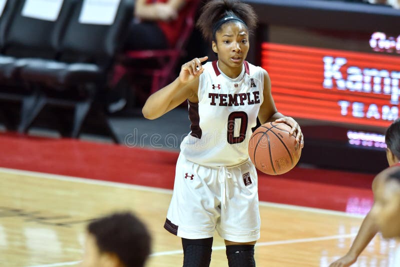 PHILADELPHIA - DECEMBER 19: Temple Owls guard Alliya Butts (0) dribbles the ball on the perimeter during the women's basketball game December 19, 2015 in Philadelphia. PHILADELPHIA - DECEMBER 19: Temple Owls guard Alliya Butts (0) dribbles the ball on the perimeter during the women's basketball game December 19, 2015 in Philadelphia.
