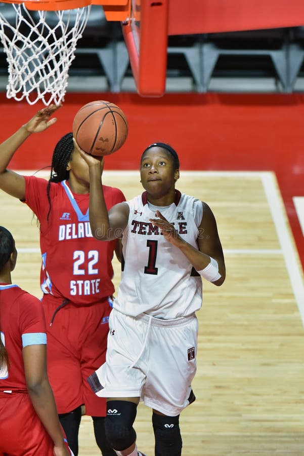 Temple Owls guard ERICA COVILE (1) puts up a running shot on the baseline during the NCAA women's basketball game played at the Liacouras Center in Philadelphia. Temple Owls guard ERICA COVILE (1) puts up a running shot on the baseline during the NCAA women's basketball game played at the Liacouras Center in Philadelphia.