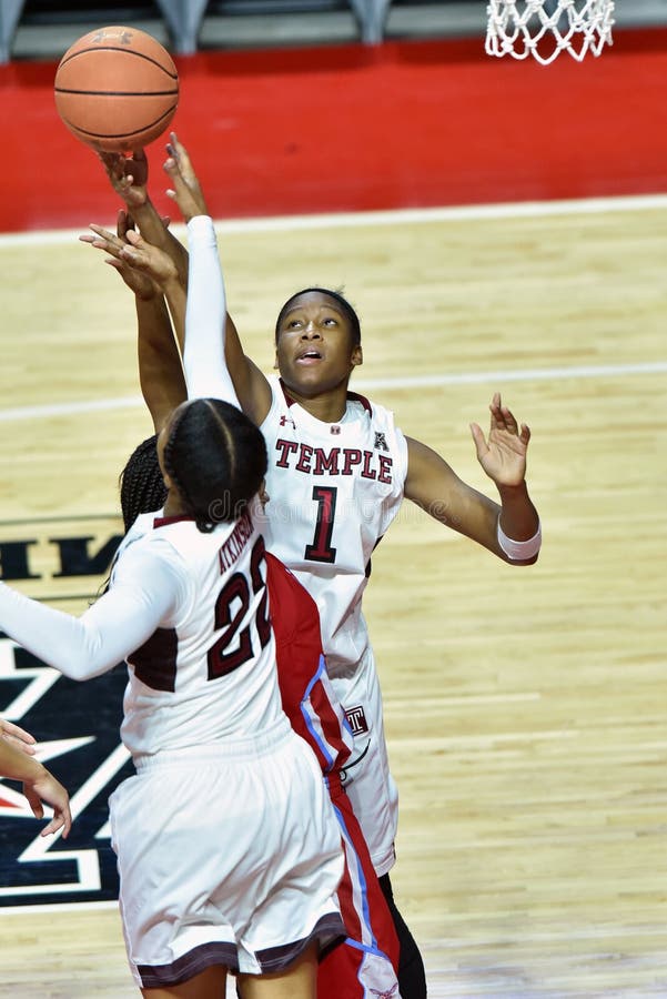 Temple Owls guards ERICA COVILE (1) and TANAYA ATKINSON (22) battle for a rebound during the NCAA women's basketball game played at the Liacouras Center in Philadelphia. Temple Owls guards ERICA COVILE (1) and TANAYA ATKINSON (22) battle for a rebound during the NCAA women's basketball game played at the Liacouras Center in Philadelphia.