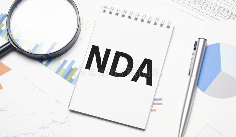Nda palavra sobre amplificador e gráficos de caneta fotografia de stock