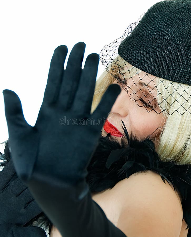 Beauty woman closes face with her hand from photograph. Beauty woman closes face with her hand from photograph