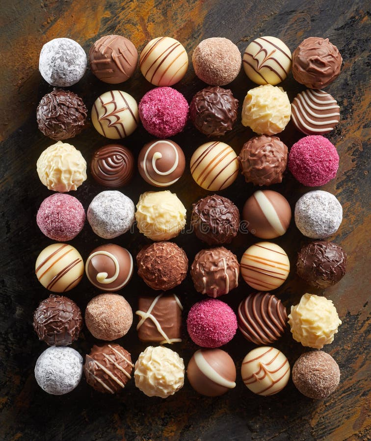Neat flat lay of luxury chocolate pralines royalty free stock images