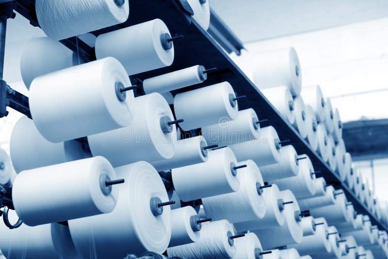 Neatly arranged cotton yarn stock photo