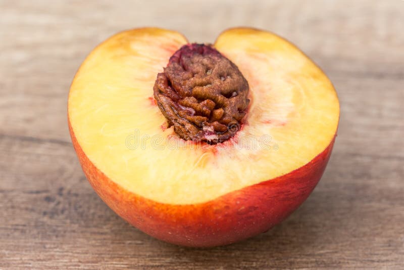 Nectarine on Table stock image. Image of kernel, cutout 45635875