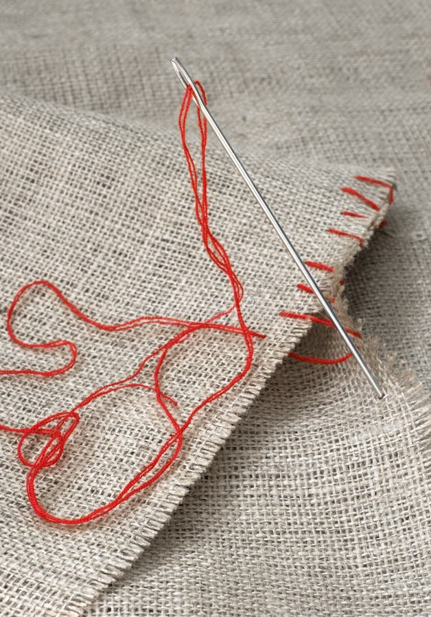 Needle In Canvas With Red Thread For Embroidery Embroidery Macro Close Up  View From Above Free Copy Space Stock Photo - Download Image Now - iStock