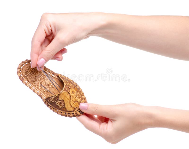 Needle pillow sewing in hand stock images Needle pillow sewing in hand stock images
