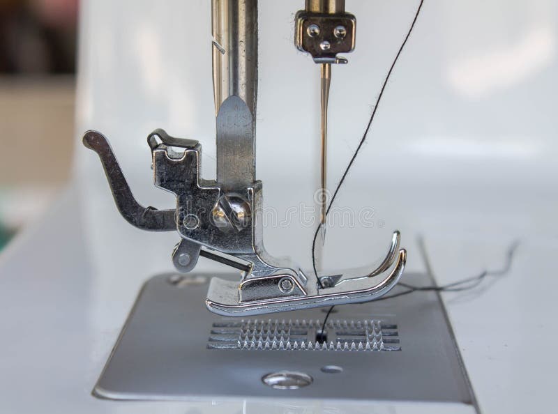 Needle of sewing machine stock photo. Image of tailoring 66271940