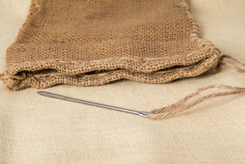Needle and sewing rope stock image. Image of color, closeup 125392549