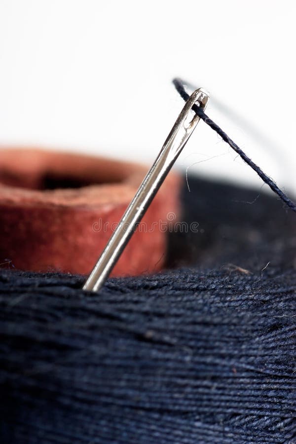 Needle and thread stock photo. Image of reflection, permeation 22684312