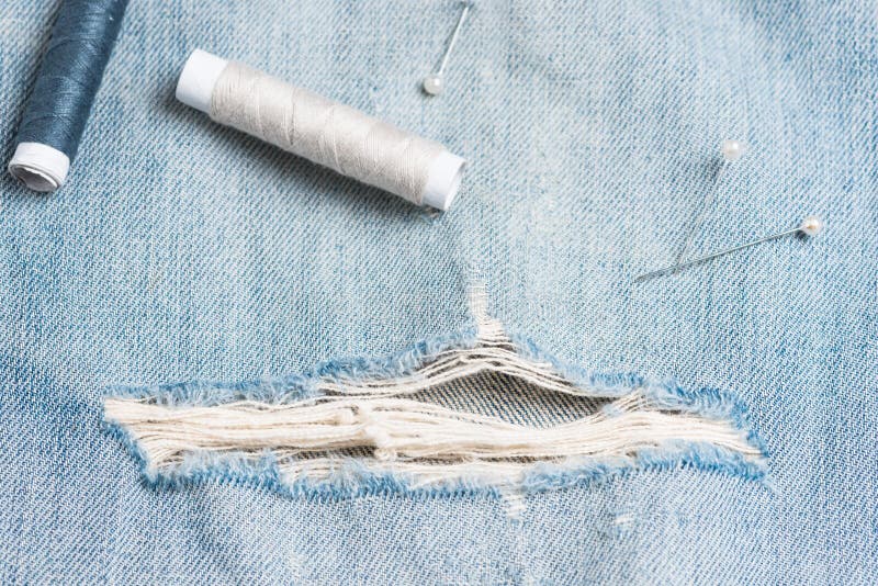 The Needle with a Thread through the Jean Stock Image Image of rough