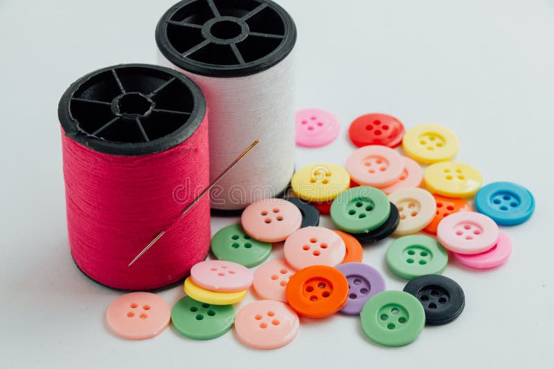 Needle with Thread/ Spool of Thread and Buttons, Sew Instrument Stock