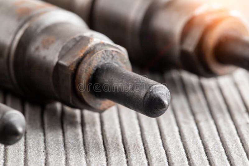 Needles and Nozzles on Nozzles from a Diesel Engine. Deterioration of