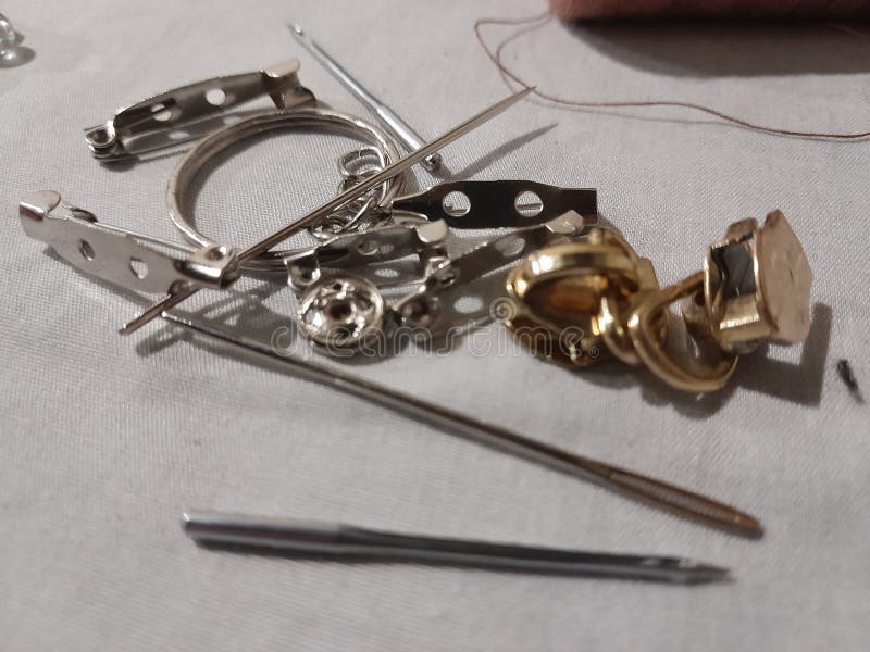 Needles, Safety Pins and Thread for Crafts Stock Photo Image of brass