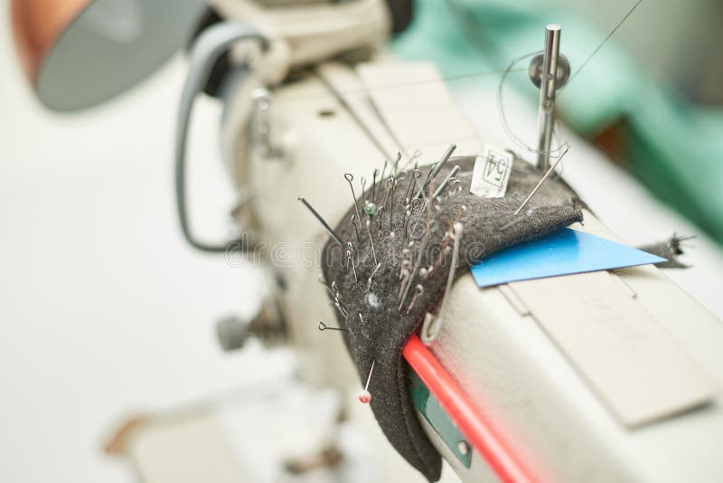 The Needles are Stuck in the Pillow on the Sewing Machine Stock Photo