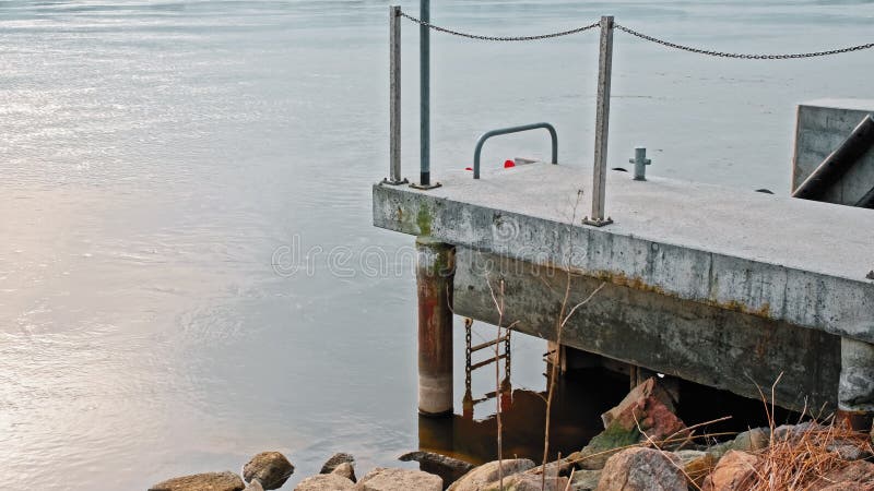 Neglected Reinforced Concrete Quay for Paddle and Motor Boat Mooring at Strong Current River