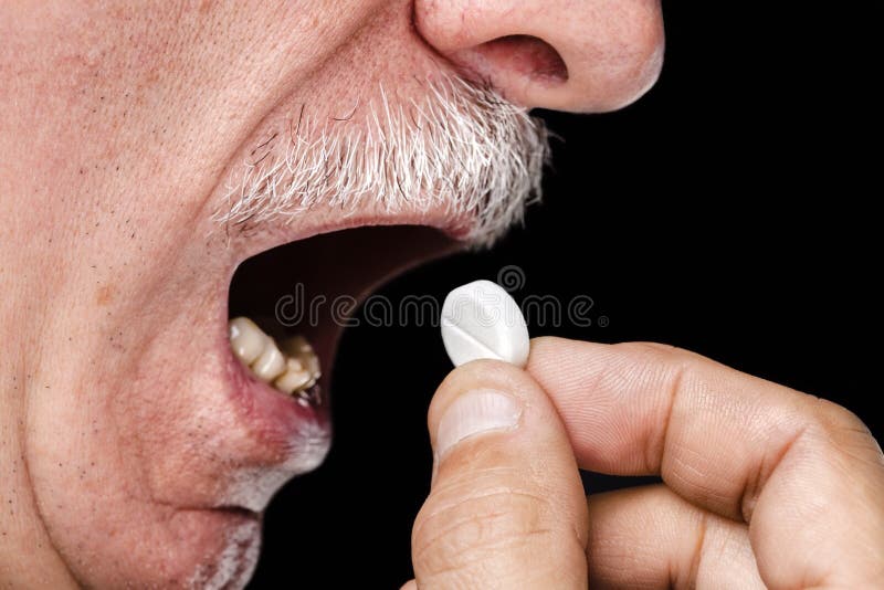 Old man wants to take a pill. Old man wants to take a pill