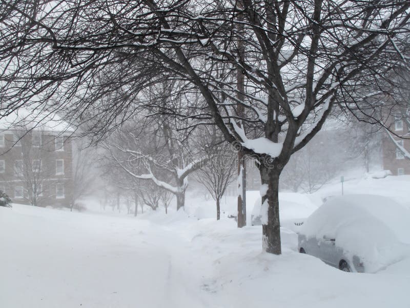 Neighborhood Sidewalk During the Blizzard stock images Neighborhood Sidewalk During the Blizzard stock images