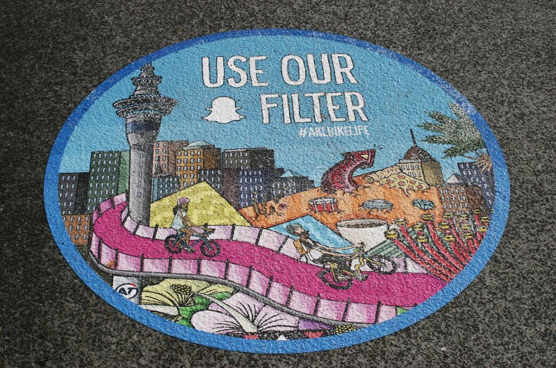 Colourful circular graphics of elevated path, city skyline and Sky tower on ground at entry of bicycle trail. Colored round picture of raised pathway, urban buildings and Skytower at entrance of bike passageway. Coloured cartoon circle of cycling passage and downtown CBD towers. Graphics way stock images, royalty-free photos and pictures