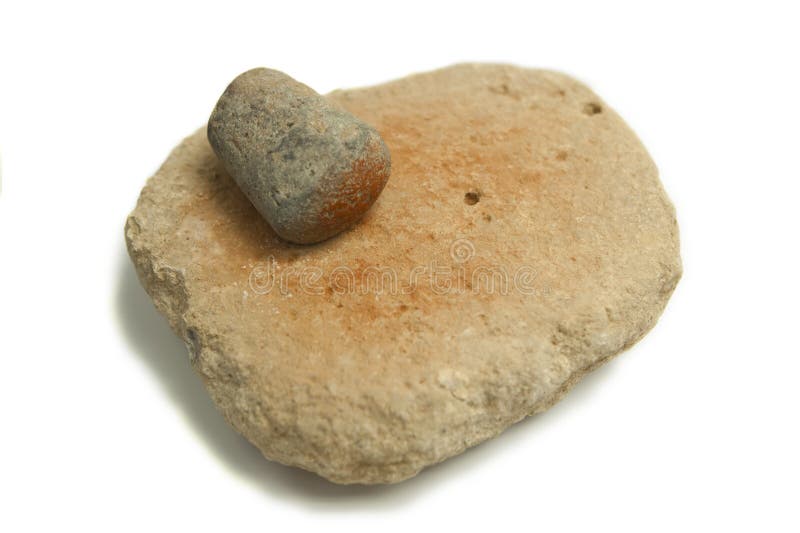 Antequera, Spain - July 14th, 2017: Neolithic hand mill for red ochre dust. Municipal Museum of Antequera, Malaga, Spain. Antequera, Spain - July 14th, 2017: Neolithic hand mill for red ochre dust. Municipal Museum of Antequera, Malaga, Spain