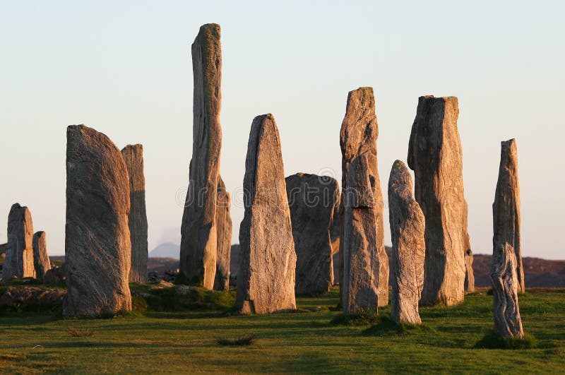 Standing stone circle at Callanish, Isle of Lewis, Outer Hebrides. Photographed in late evening sunlight. Standing stone circle at Callanish, Isle of Lewis, Outer Hebrides. Photographed in late evening sunlight.