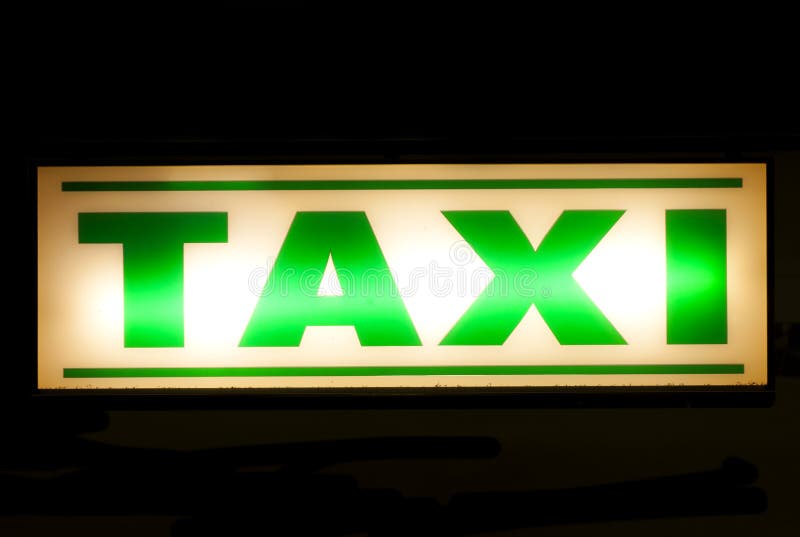 Neon green taxi sign