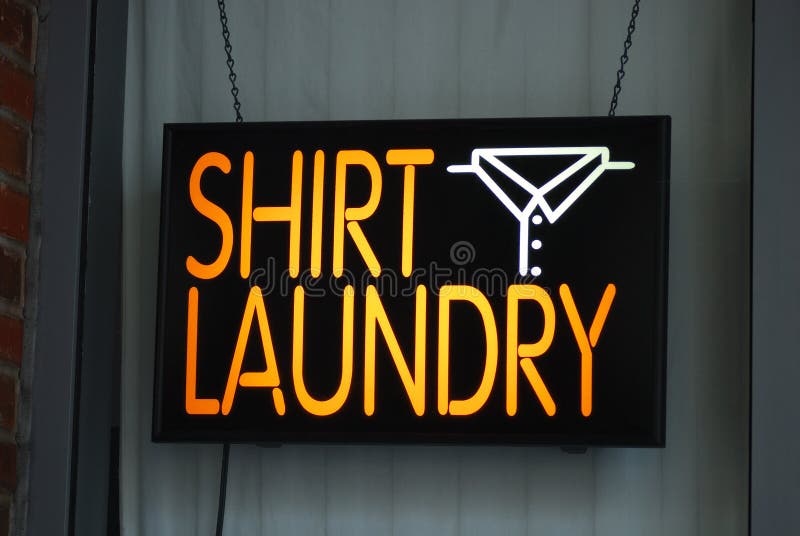 A neon sign of the laundry shop