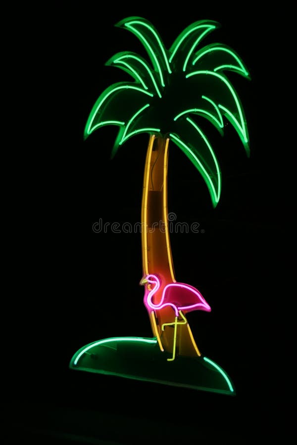 Neon sign with palm tree and flamingo