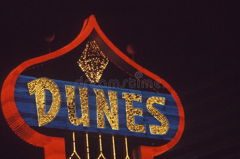 A neon sign that reads �Dunes� stock images