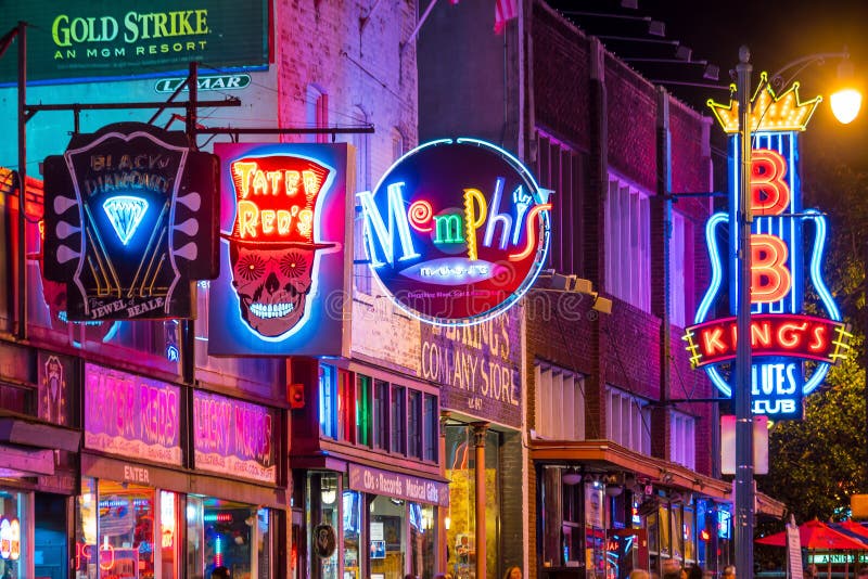 Neon signs on Beale street. MEMPHIS, USA - NOV 12: Neon signs of famous blues clubs on Beale street on November 12, 2016 Beale street is a place for blues royalty free stock image Neon signs on Beale street. MEMPHIS, USA - NOV 12: Neon signs of famous blues clubs on Beale street on November 12, 2016 Beale street is a place for blues royalty free stock image