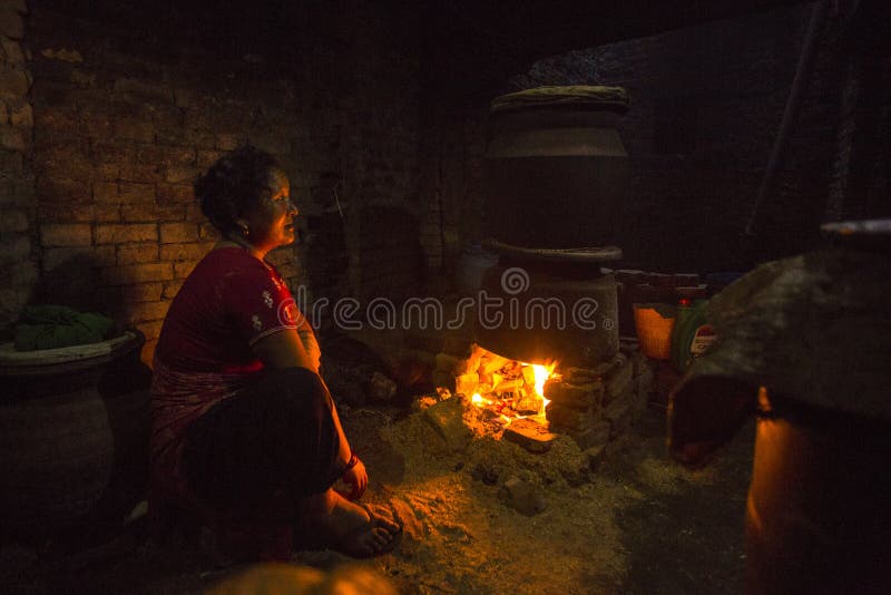 Nepalese woman working in the his pottery workshop. royalty free stock photo