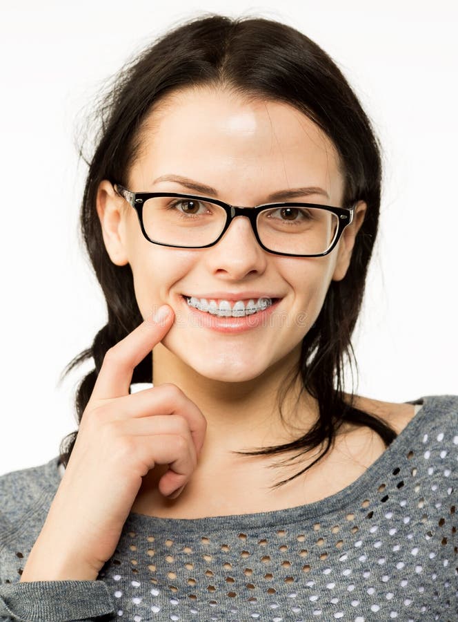 Nerd Girl In Glasses And Brackets On Teeth Positive