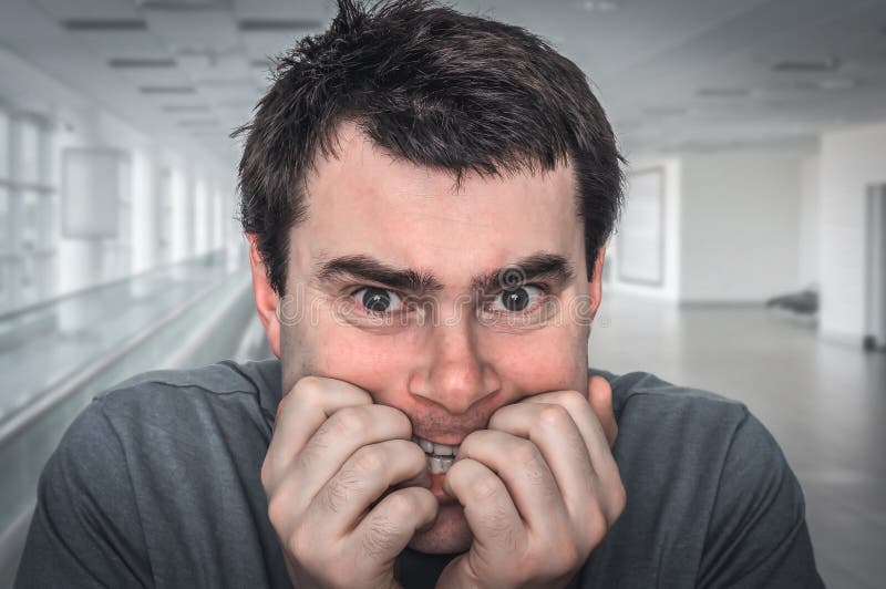 Nervous man biting his nails - nervous breakdown stock photos Nervous man biting his nails - nervous breakdown stock photos