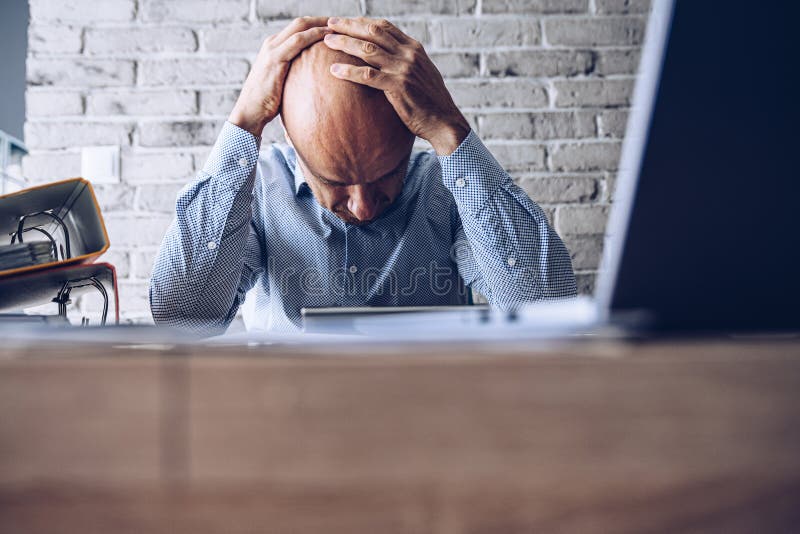 Nervous upset man with financial problems. Depressed man and financial crisis