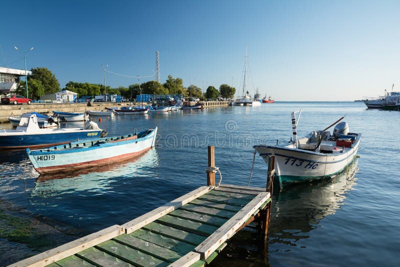 NESSEBAR, BULGARIA, AUGUST 14, 2016: Old wooden fishing boats in port of Nessebar, ancient town on the Black Sea coast of Bulgaria stock photos NESSEBAR, BULGARIA, AUGUST 14, 2016: Old wooden fishing boats in port of Nessebar, ancient town on the Black Sea coast of Bulgaria stock photos