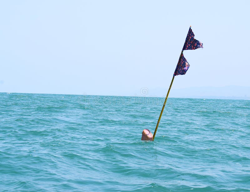 https://thumbs.dreamstime.com/b/net-buoy-marker-double-flag-sea-photograph-which-used-to-mark-sight-fishing-93145589.jpg