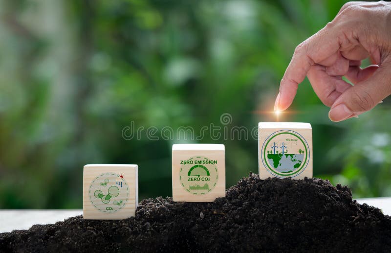 Net carbon neutrality. With relation to business, the hand of pollution and effective management with netzero symbols - renewable stock images