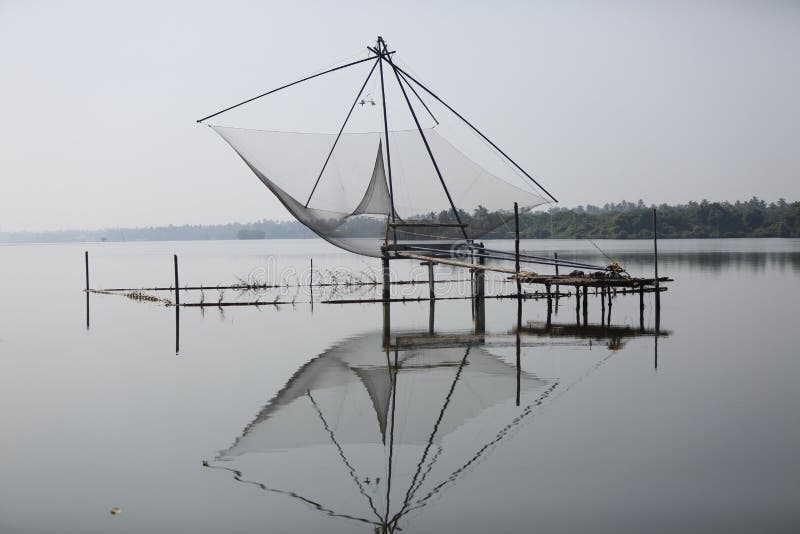 Old Fishing Net is Hanging on the Wood Wall Stock Photo - Image of